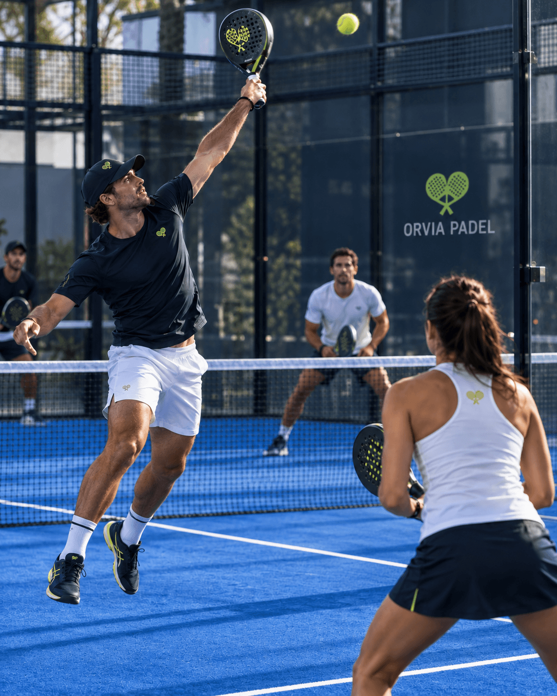 Padel players competing on an ORVIA court